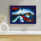 A framed horizontal canvas print of a stylized city skyline with two tall vertical light beams, displayed on a white shelf against a light gray wall next to a white vase with flowers.