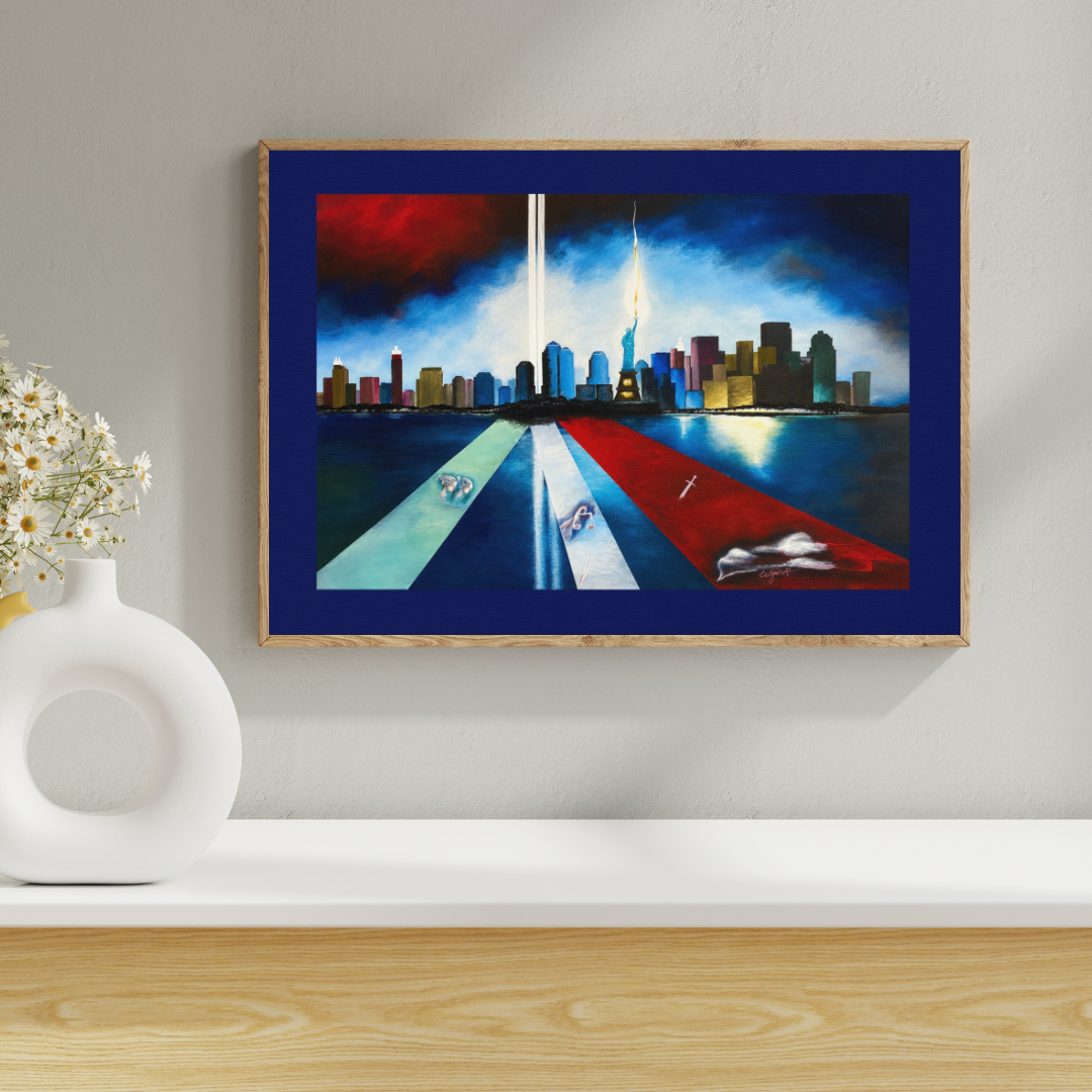 A framed horizontal canvas print of a stylized city skyline with two tall vertical light beams, displayed on a white shelf against a light gray wall next to a white vase with flowers.
