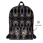 Apparelhue Art backpack held by the top handle in an outdoor setting.