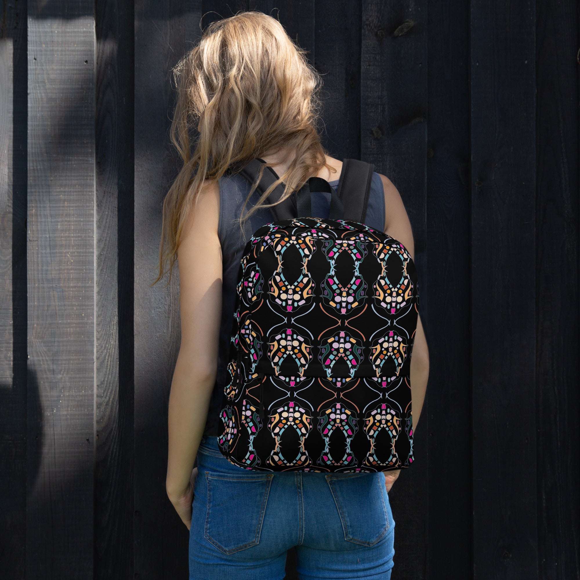 Front view of Apparelhue Art abstract all-over print backpack in vibrant colours.