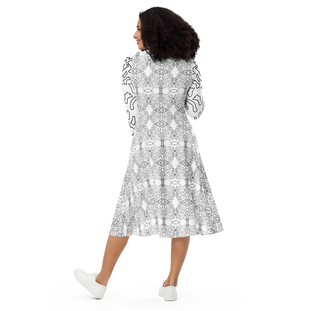 Model wearing APPARELHUE white long-sleeve midi dress with intricate grey and black graphic print.