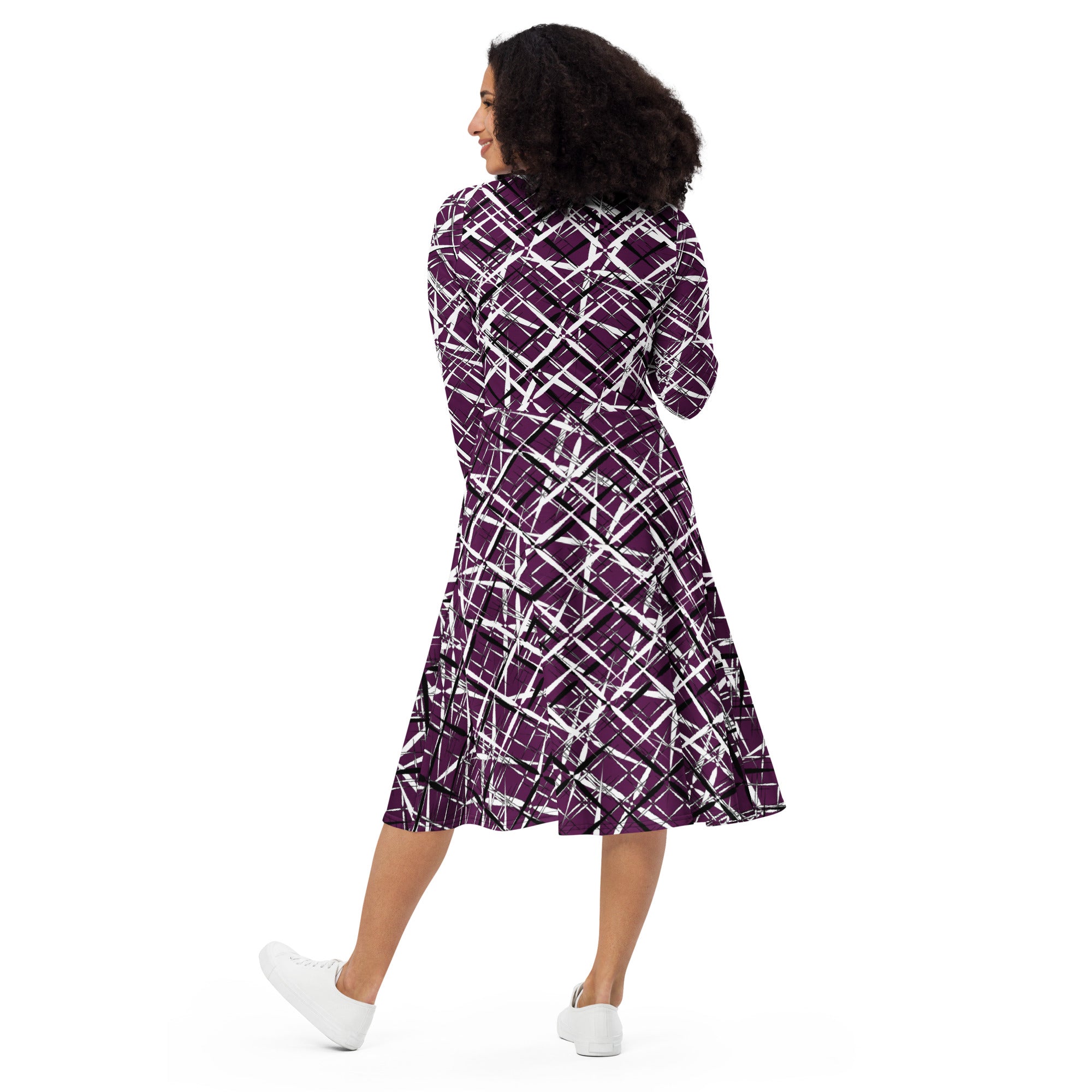 Model wearing APPARELHUE plum purple long-sleeve midi dress with an all-over white and black geometric scratch-effect print.