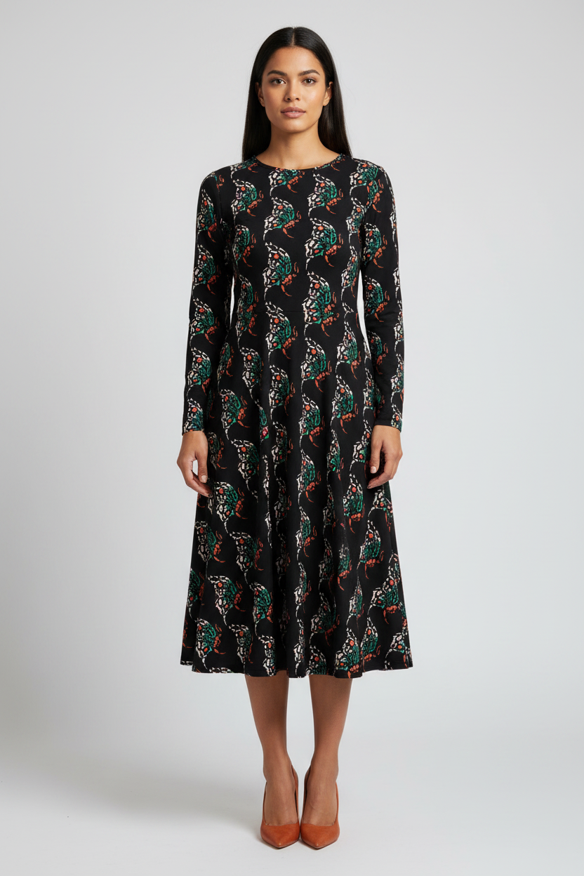 Woman wearing a black floral dress on a white background