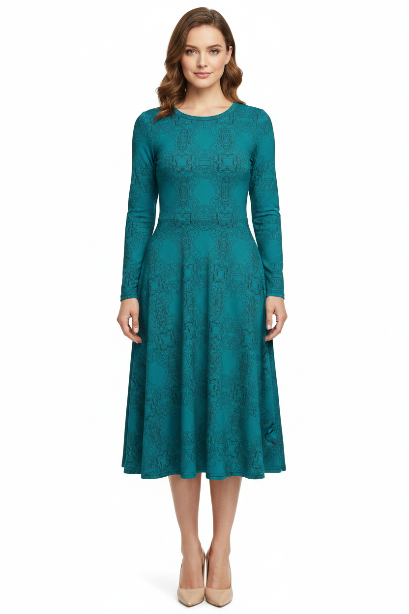 Woman wearing a teal dress on a white background
