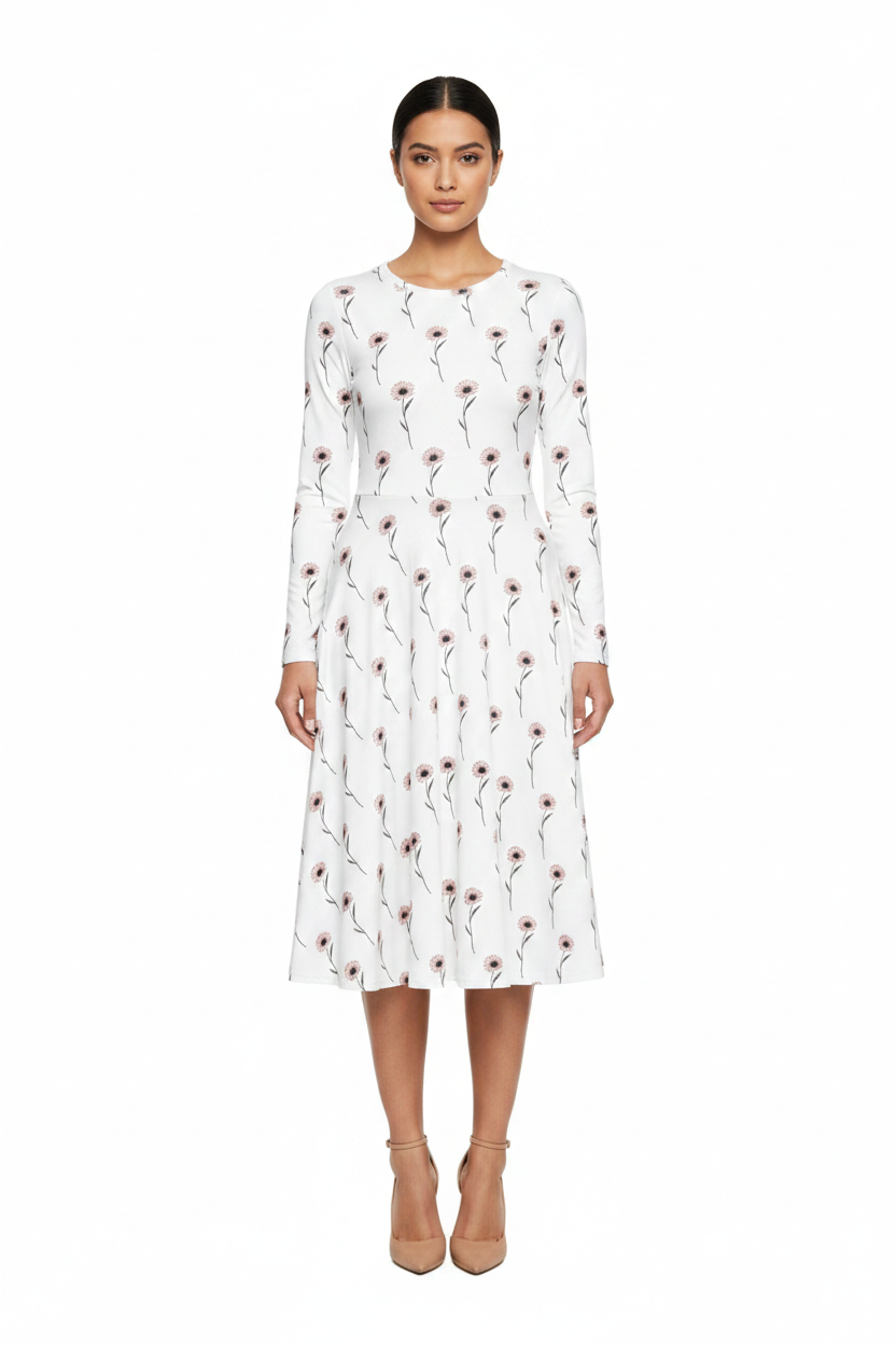 Woman wearing a white dress with red floral pattern on a white background