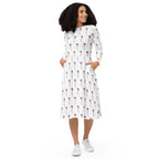Woman wearing a white dress with a red pattern on a white background