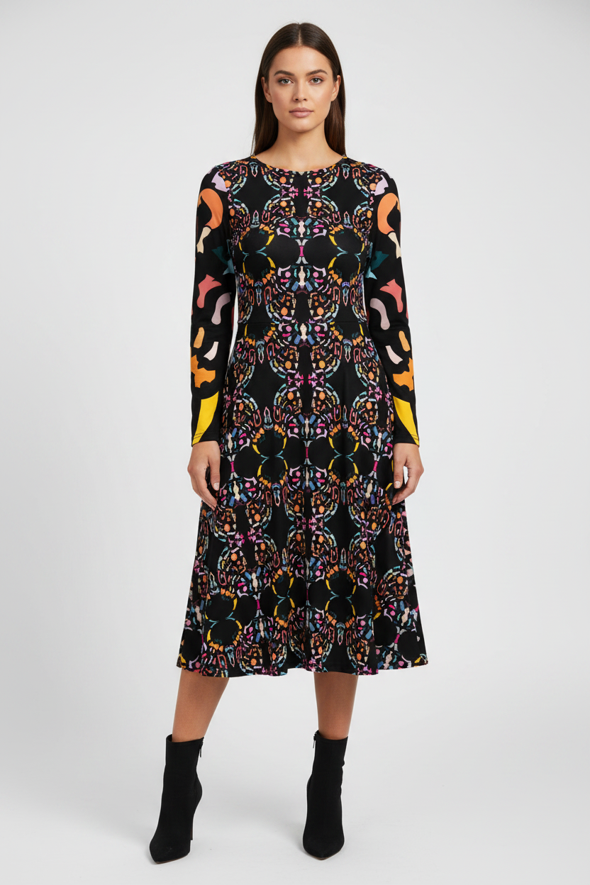 Woman wearing a patterned dress on a white background