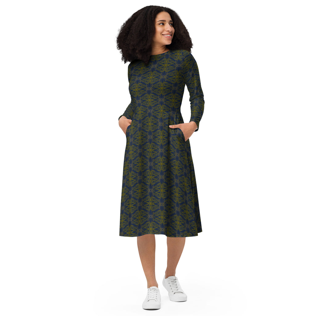 Model walking in the abstract print statement dress.