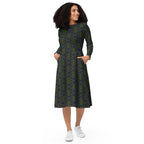 Model walking in the abstract print statement dress.