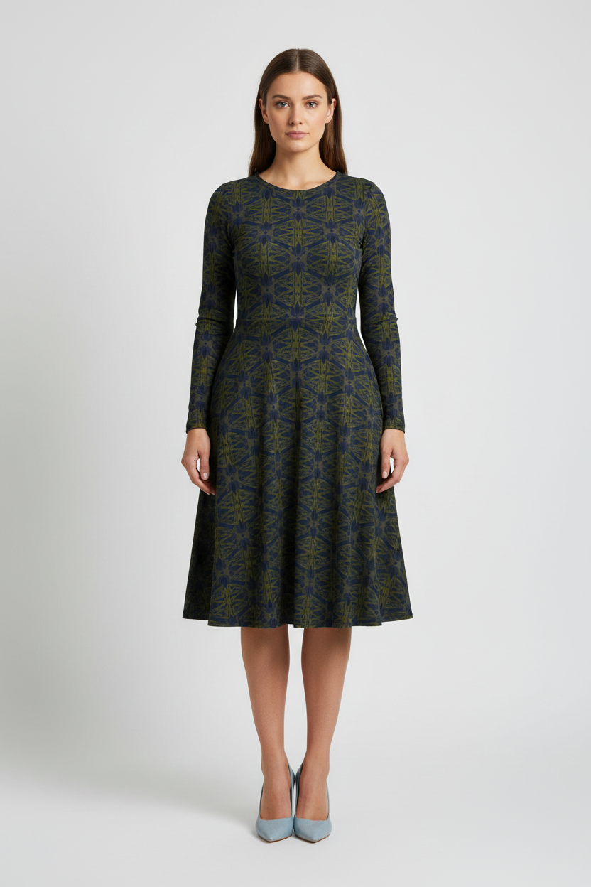 Woman wearing a patterned dress on a white background