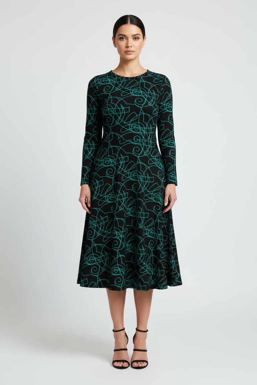 Woman wearing a dark green dress with a pattern on a white background