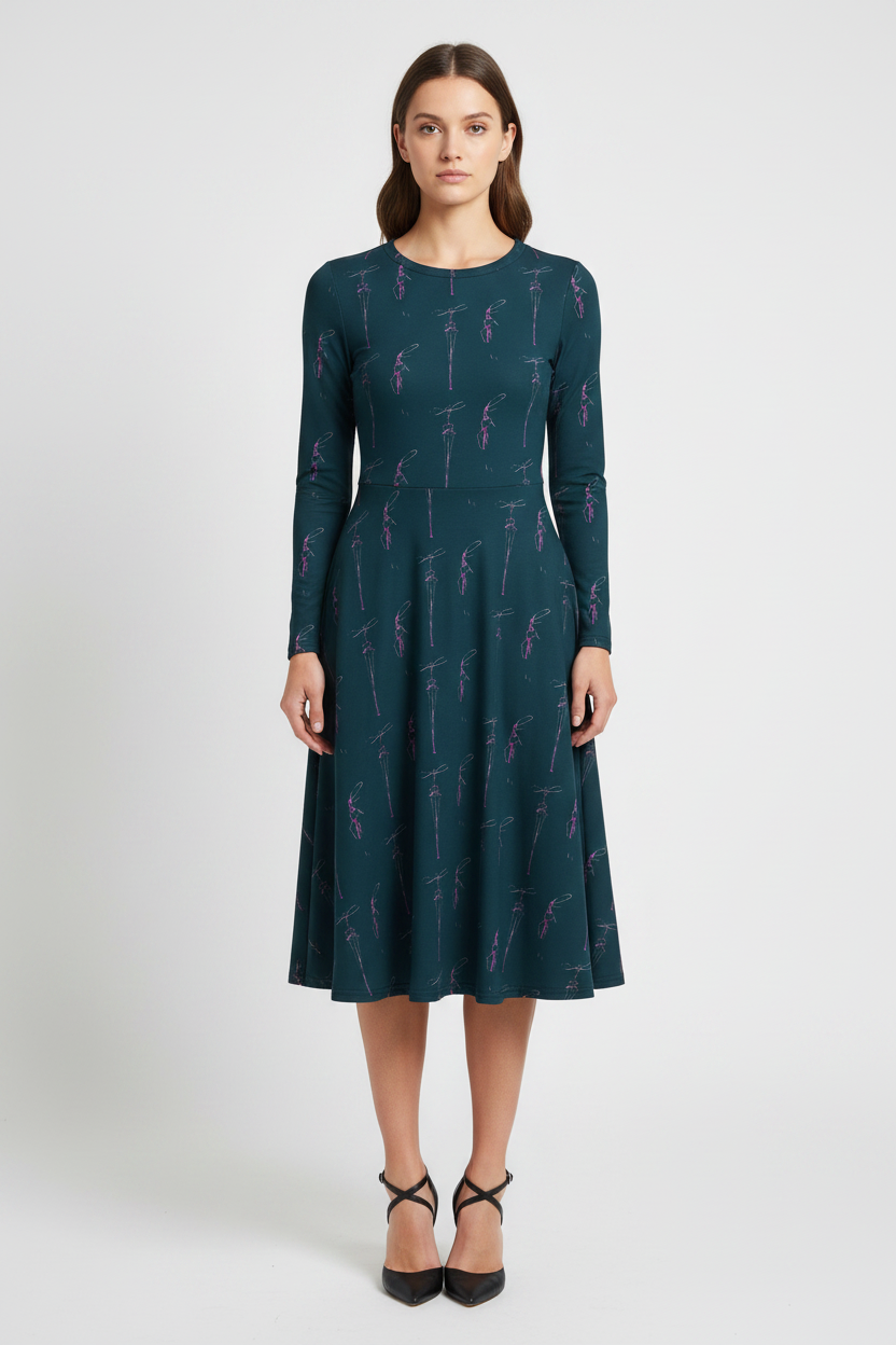 Woman wearing a dark green dress with a pattern on a white background