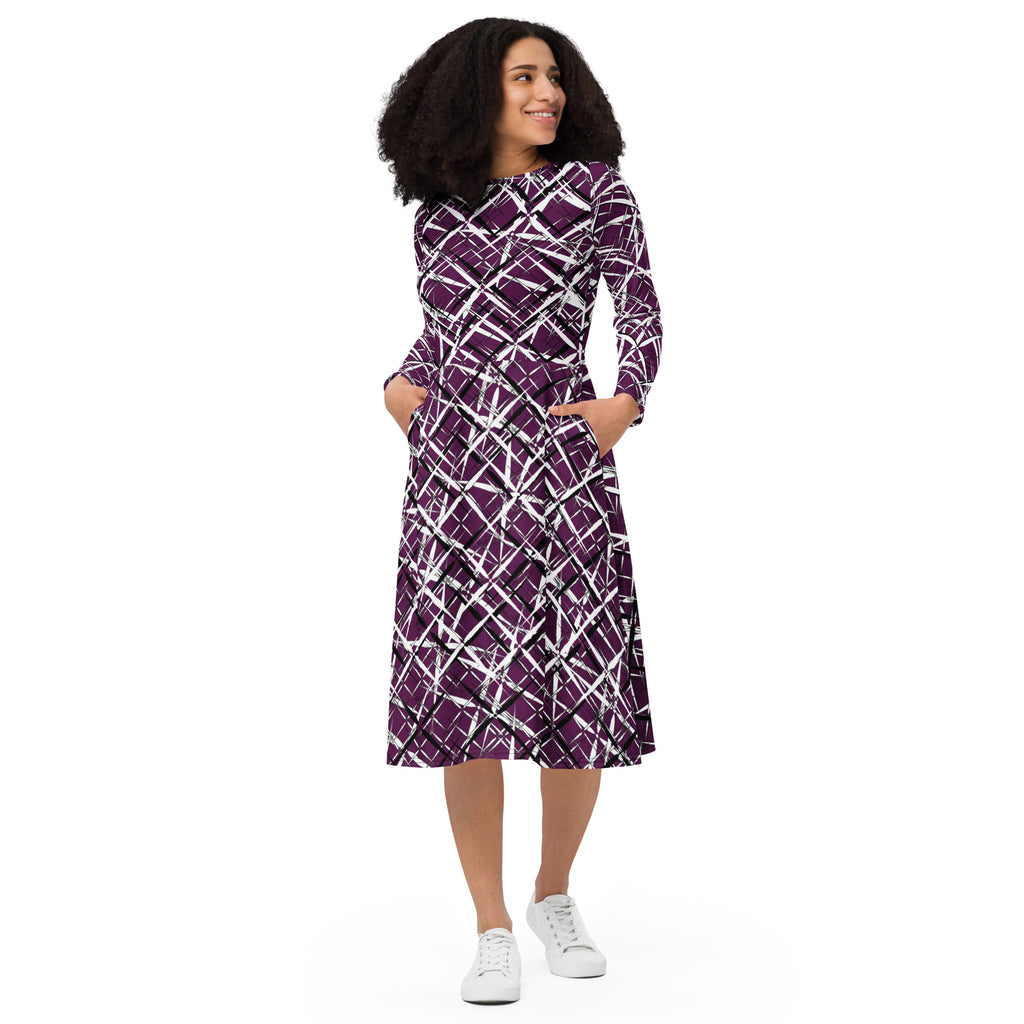 APPARELHUE artistic fashion dress with an eye-catching purple, black, and white linear graphic print on sleek fabric.