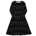 Black floral patterned dress on a white background