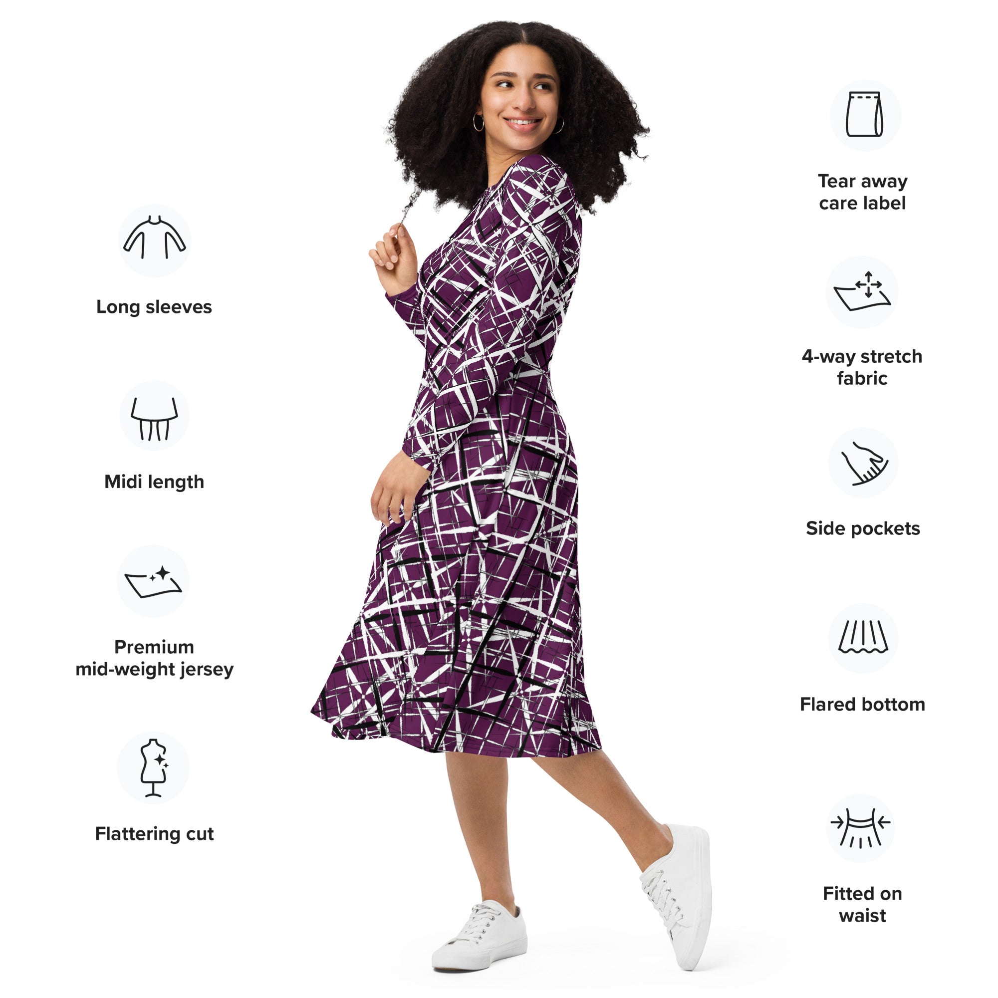 Woman modelling an APPARELHUE purple graphic print midi dress paired with black strappy heeled sandals.