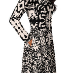 geometric print dress walking pose