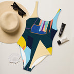 Close-up of the swimsuit's top, showing the scoop neckline and colorful abstract design.