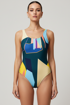 Multicolored geometric patterned swimsuit on a plain background