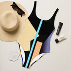 Close-up of swimsuit fabric showing vibrant abstract art print.