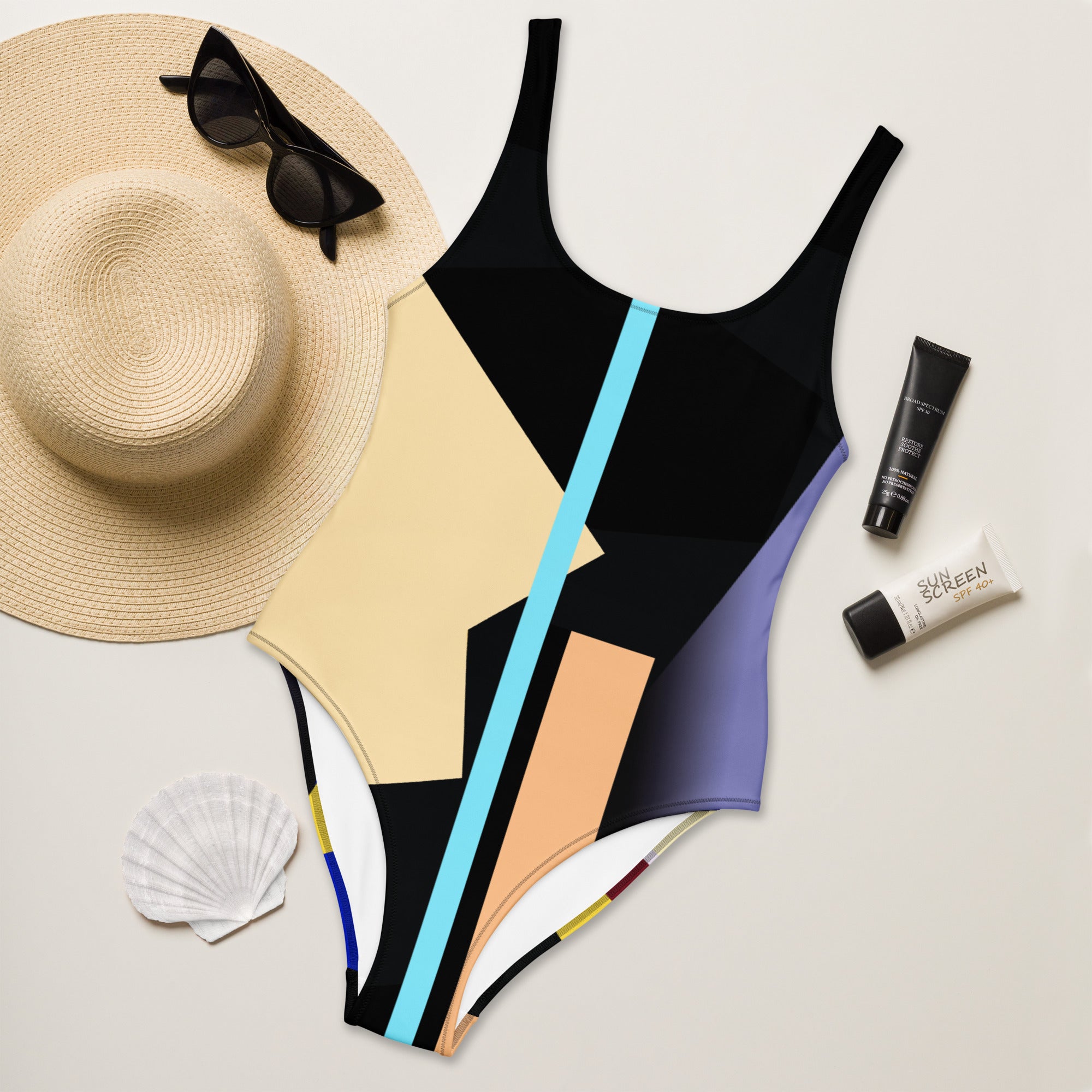 Close-up of swimsuit fabric showing vibrant abstract art print.