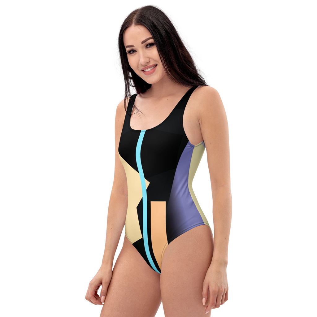 Model posing in unique geometric one-piece swimwear.