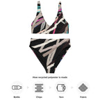 Detailed view of the fabric and print on the two-piece swimsuit.