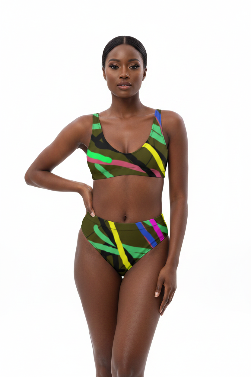 Model wearing a colorful bikini set on a white background