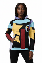 Person wearing a colorful hoodie with geometric patterns on a white background