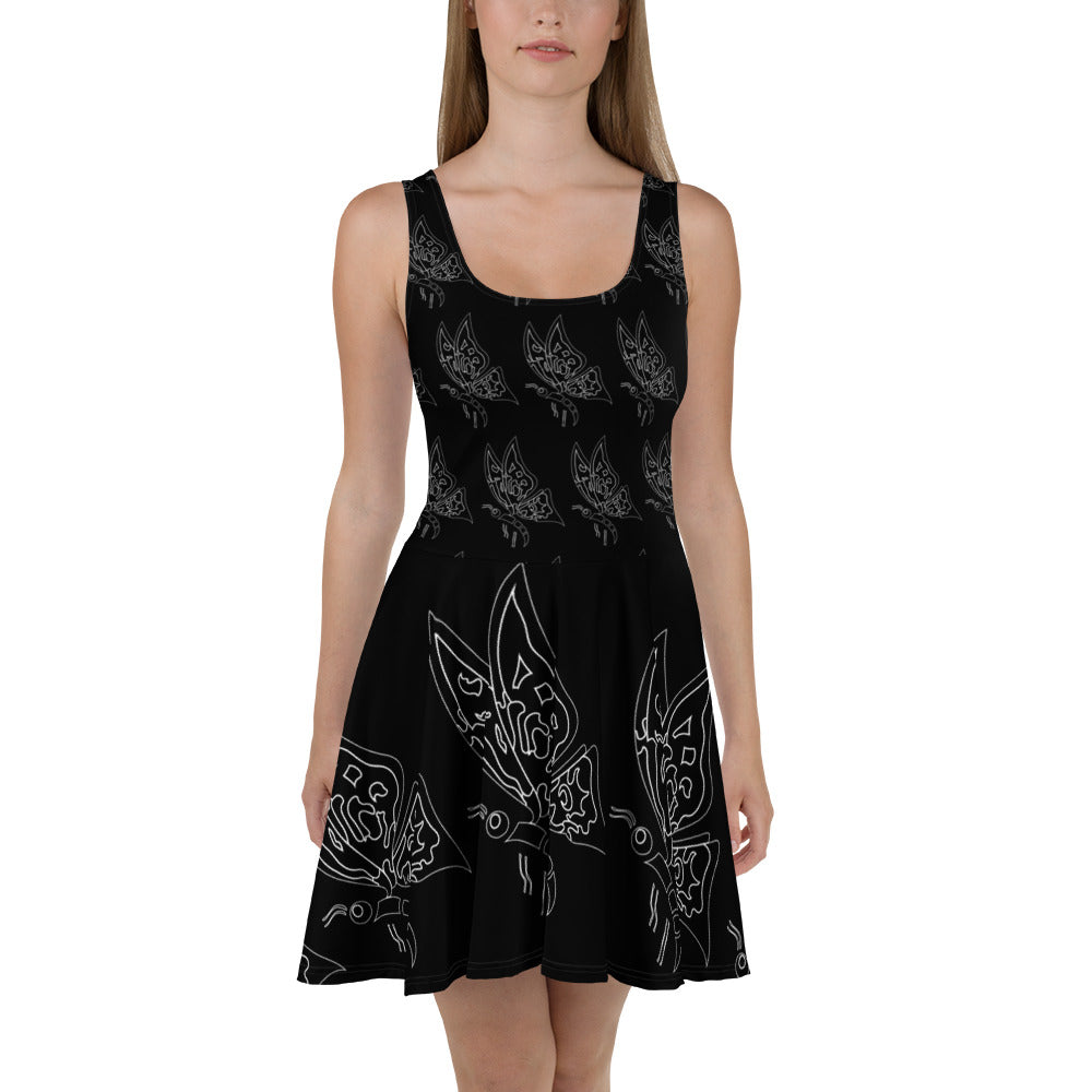 Front view of a black A-line dress with a scoop neckline and a detailed white butterfly graphic pattern.