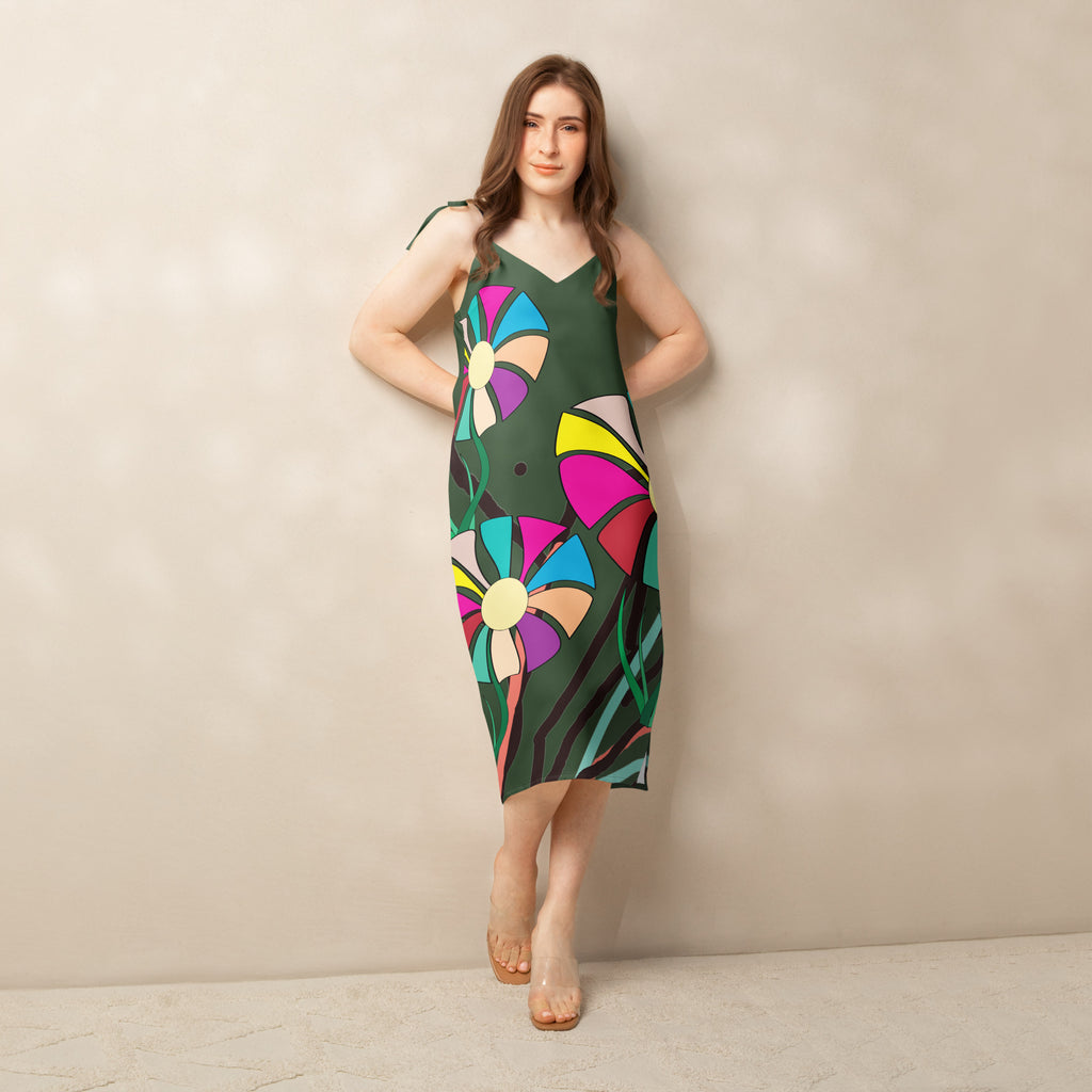 APPARELHUE statement streetwear: dark green all-over print slip dress with eye-catching multi-coloured graphics.
