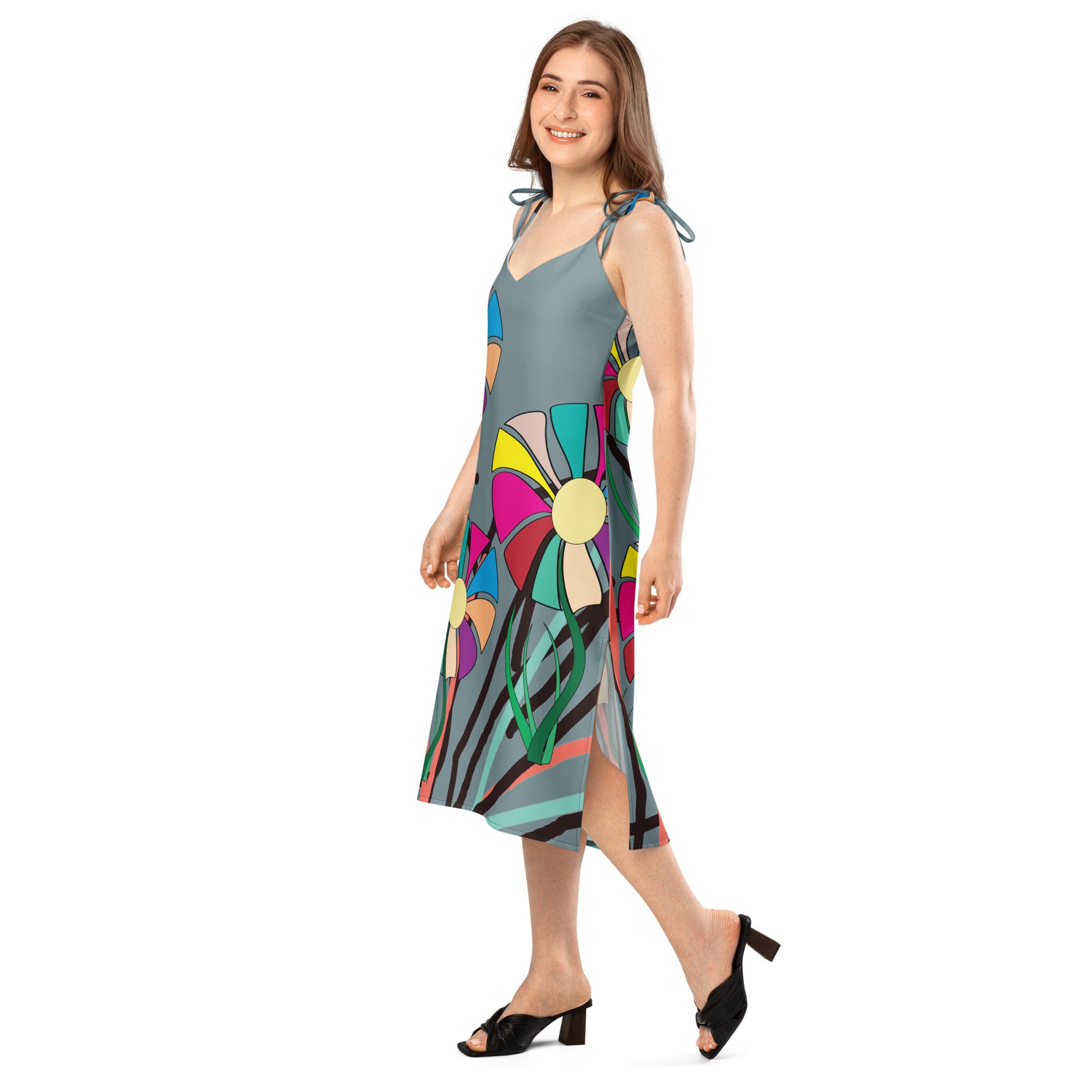 Side view of the dress, highlighting the graceful walk and the flow of the dress, showing the side slit.