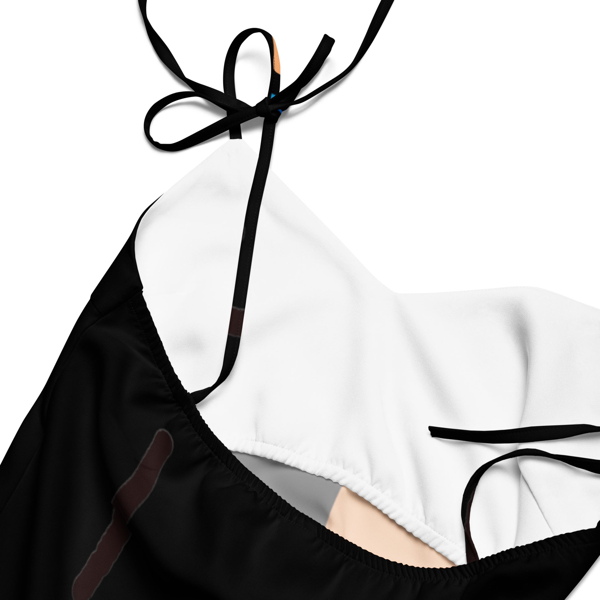 Detailed shot of the delicate tie-straps at the shoulders.