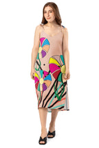 A clear shot of the v-neckline and the bold patterns on the bodice against the light fabric.