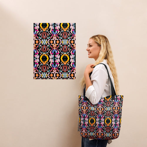 Close-up of the abstract swan graphic and all-over-print side panels on the utility rucksack.
