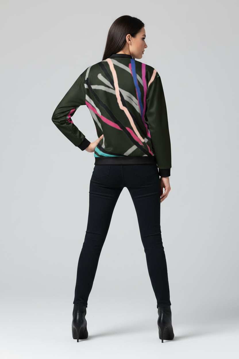 Woman wearing a patterned sweater and black pants on a white background