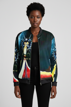 Person wearing a colorful jacket with a graphic design on a plain background
