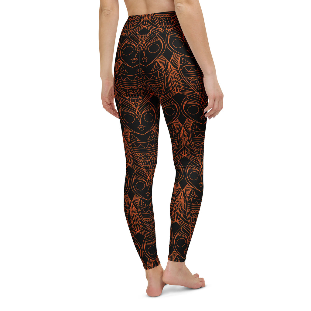 Women practising yoga in owl pattern artistic leggings – dynamic pose showing fit and flexibility.