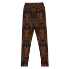 Flat lay owl yoga pants women active leggings product shot – colourful intricate print on black background.