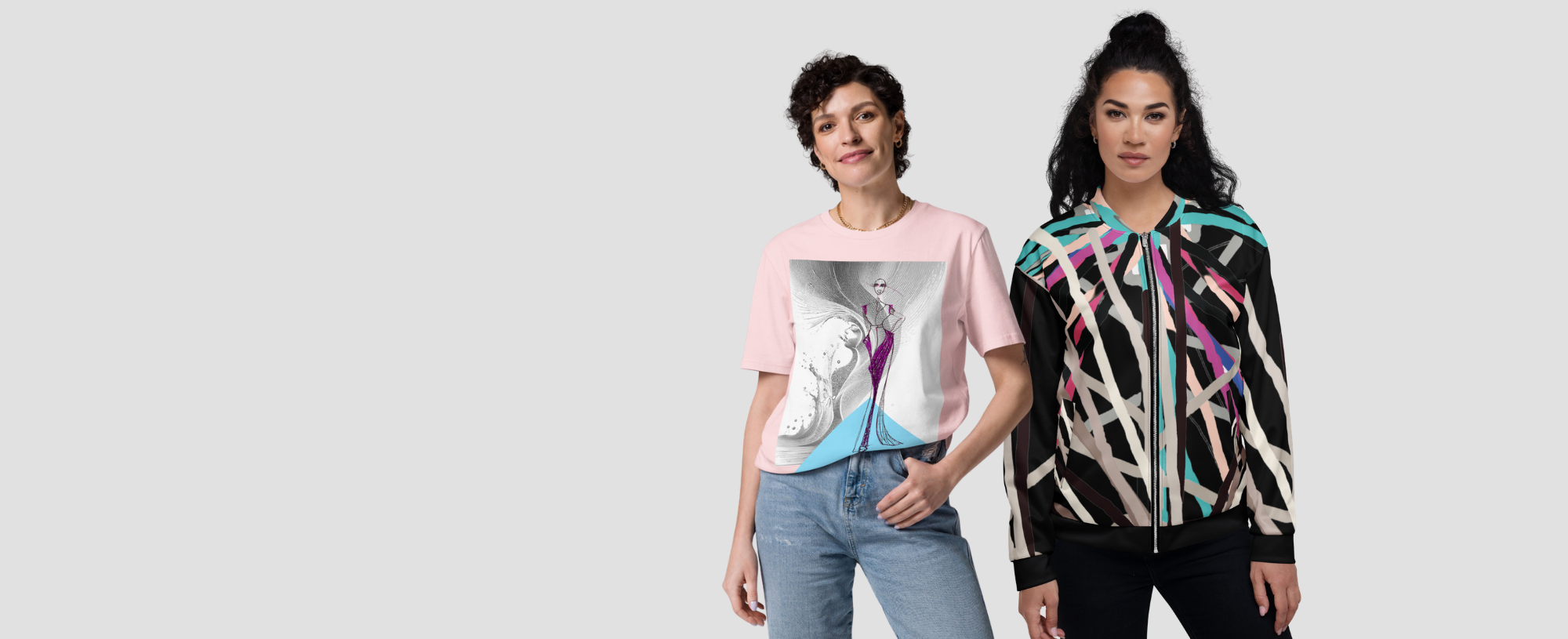 Two women wearing colorful jackets and a graphic t-shirt on a light gray background. Apparelhue hero banner showcasing three stylish models wearing a smart patterned A-line dress with a leather handbag, a casual pink graphic t-shirt, and a trendy patterned zip-up jacket.