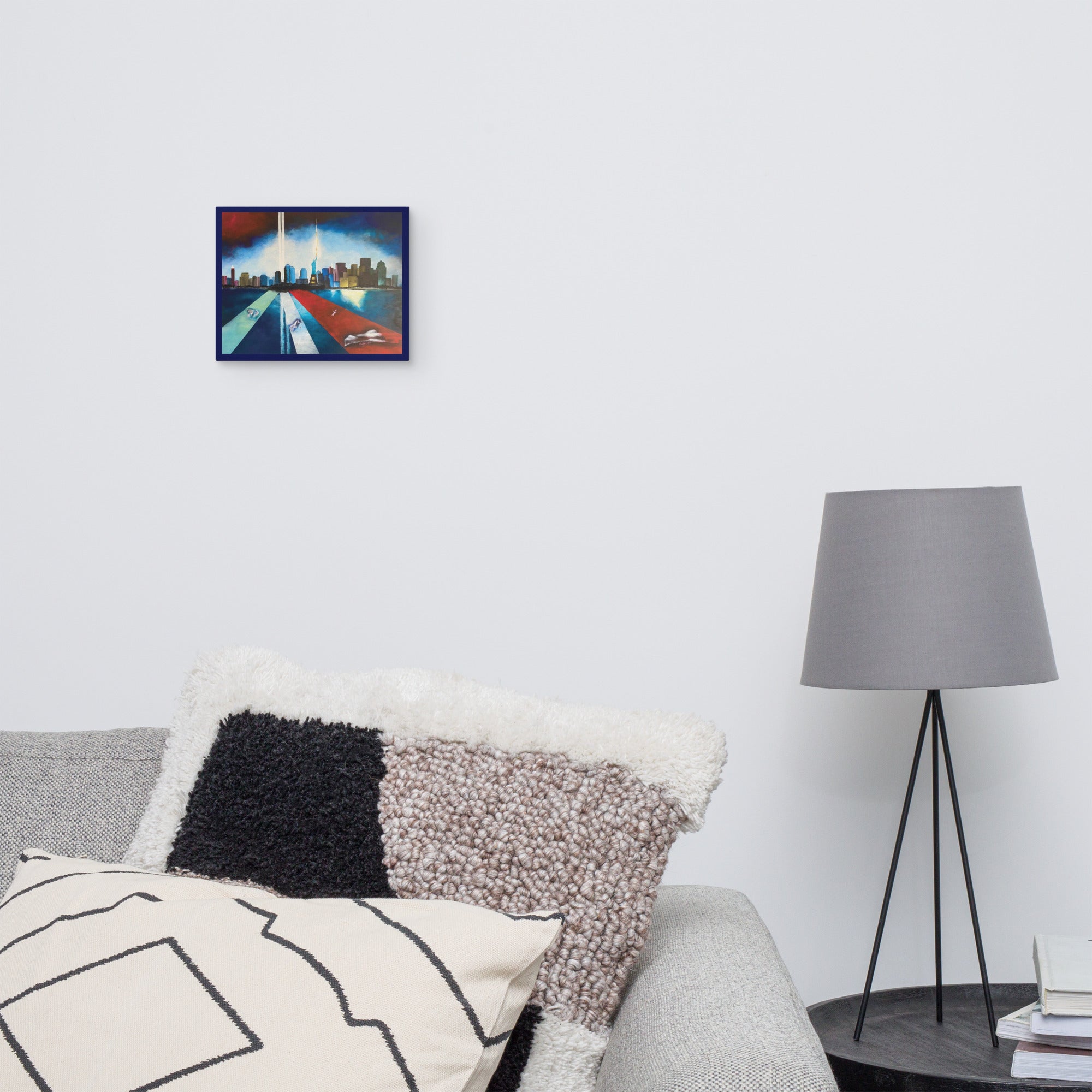 Memorial canvas artwork featuring the Statue of Liberty and symbolic beams of light.