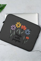 A sleek, charcoal grey Apparelhue laptop bag featuring a water-resistant exterior and reinforced handles, displayed against a minimalist white background to highlight its professional design and slim profile.