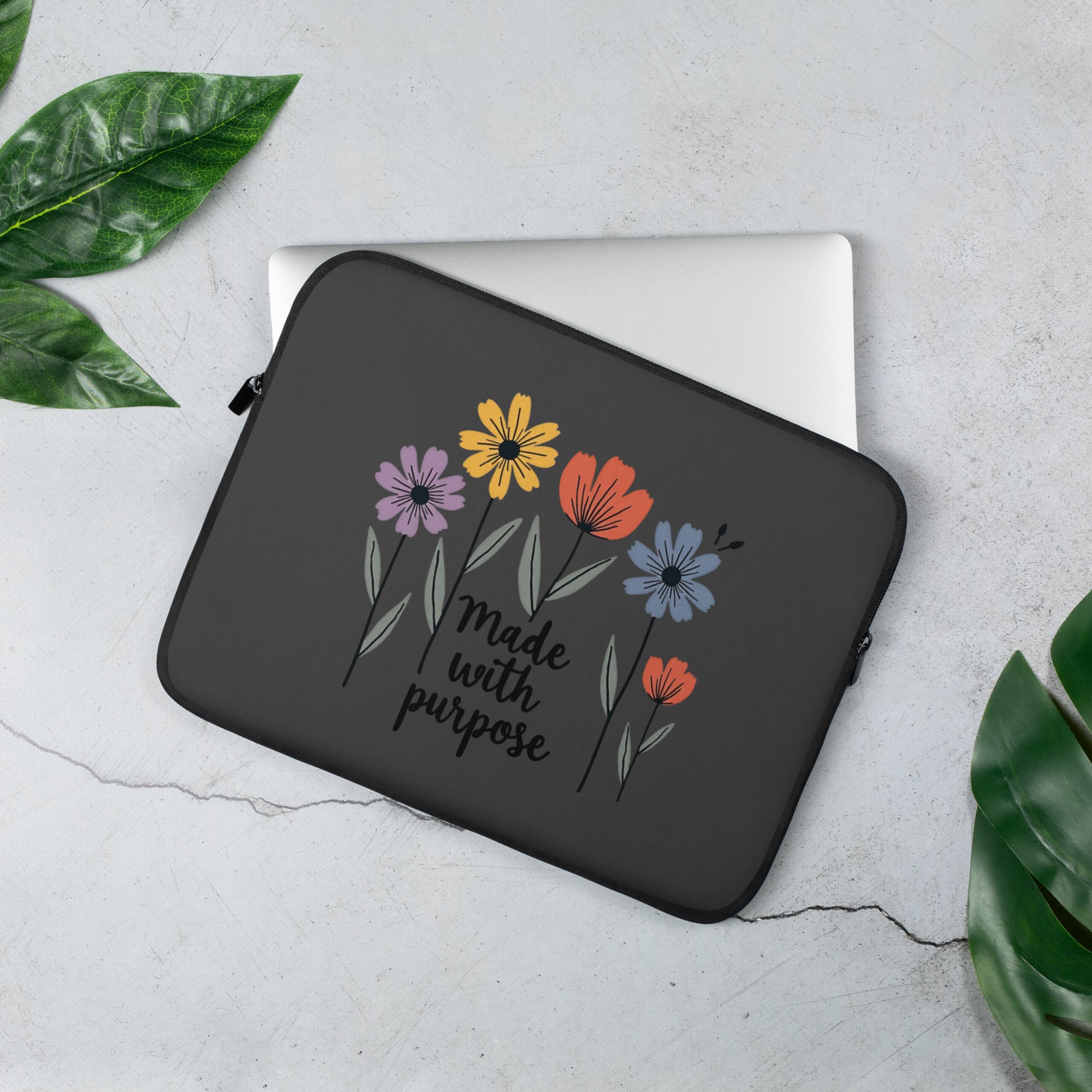 A sleek, charcoal grey Apparelhue laptop bag featuring a water-resistant exterior and reinforced handles, displayed against a minimalist white background to highlight its professional design and slim profile.