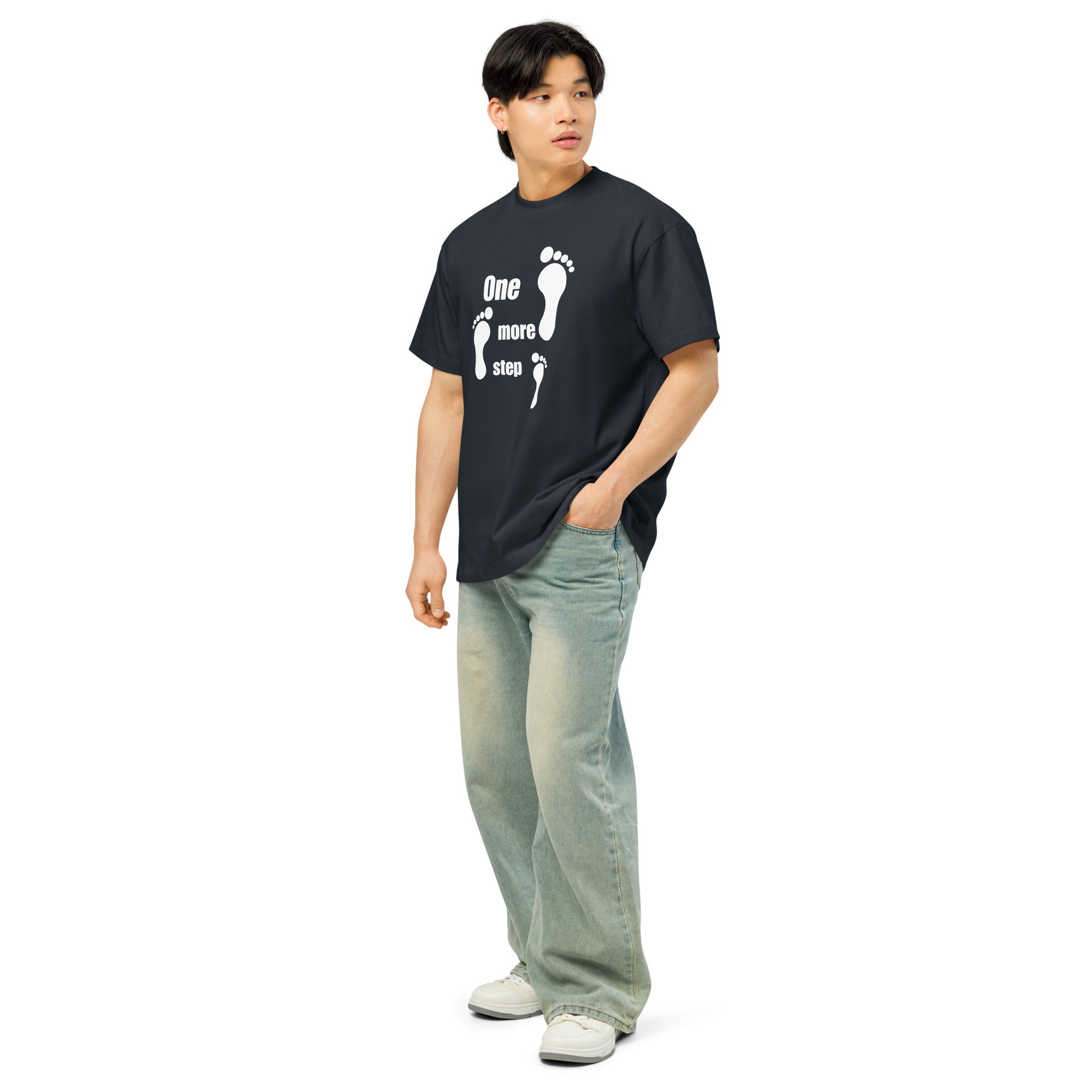 Minimalist "One More Step" design on a pastel sage green tee.