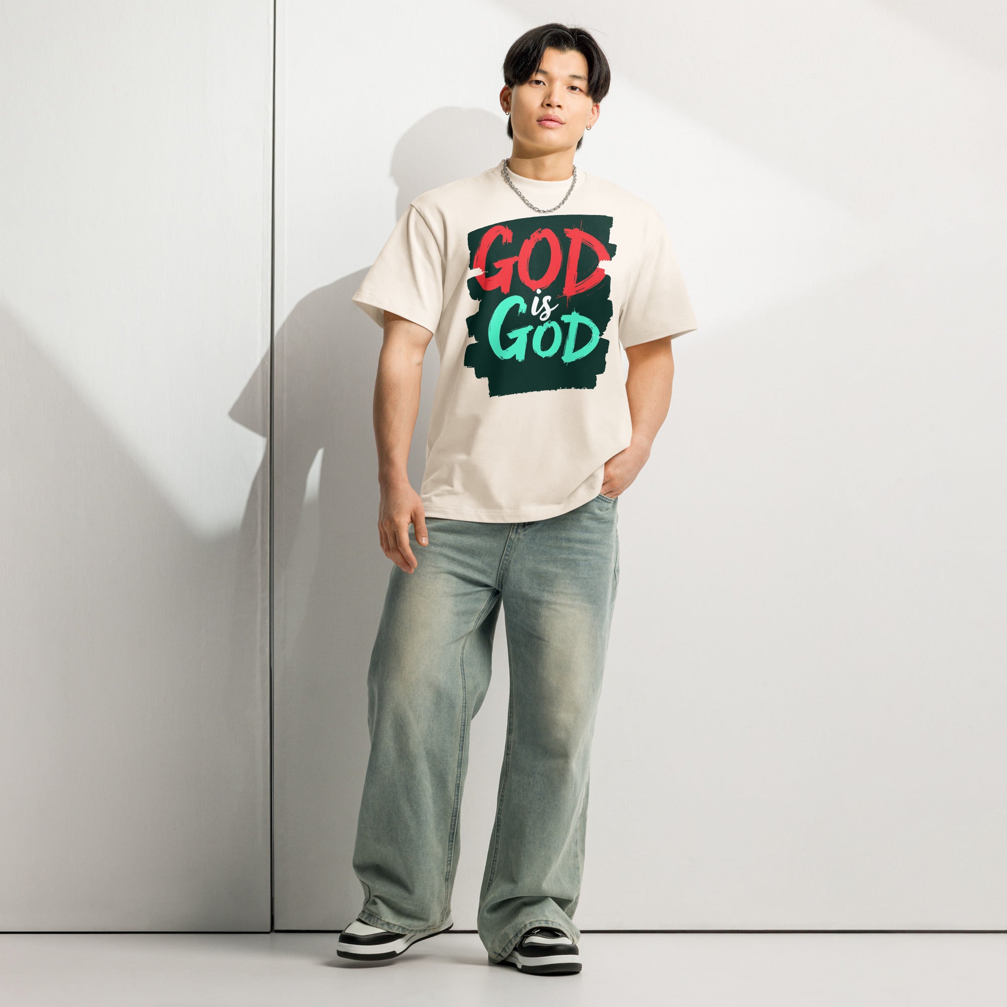 Model styling God is God tee with jeans