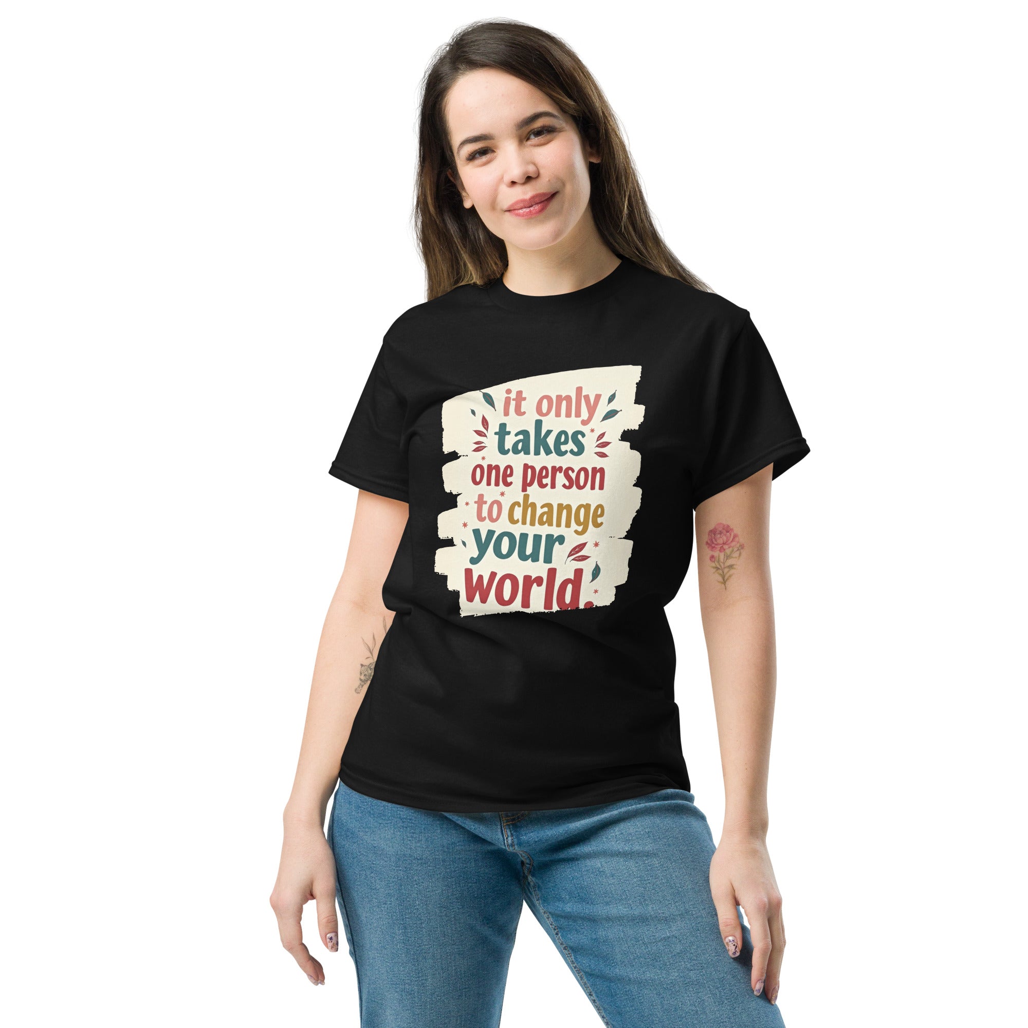Front view of black graphic t-shirt with inspirational quote about changing the world.