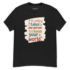 Close-up of "It only takes one person to change your world" text on white cotton t-shirt.