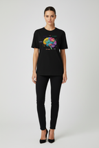 Person wearing a black t-shirt with a colorful brain graphic and text on a white background
