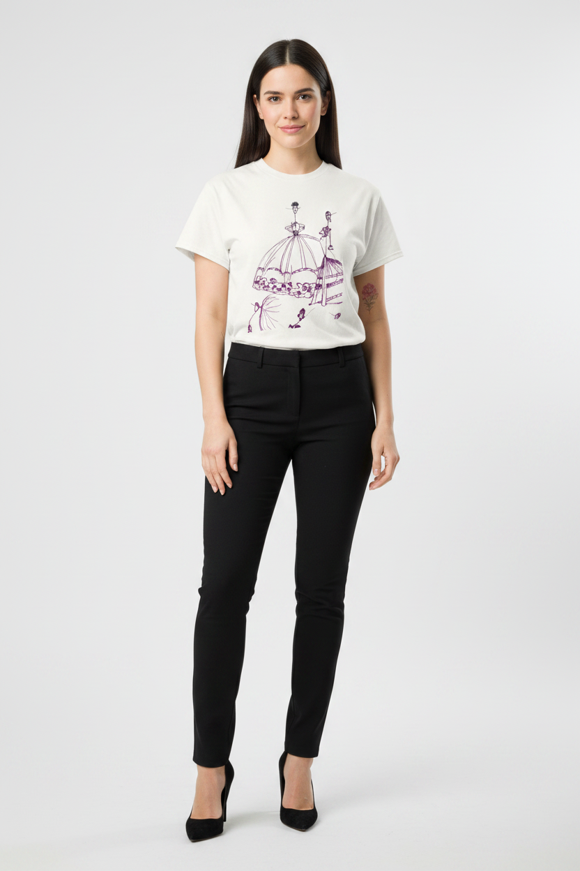 Woman wearing a white t-shirt with a graphic design and black pants on a white background