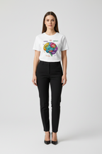 Person wearing a white t-shirt with a colorful graphic design on a plain background