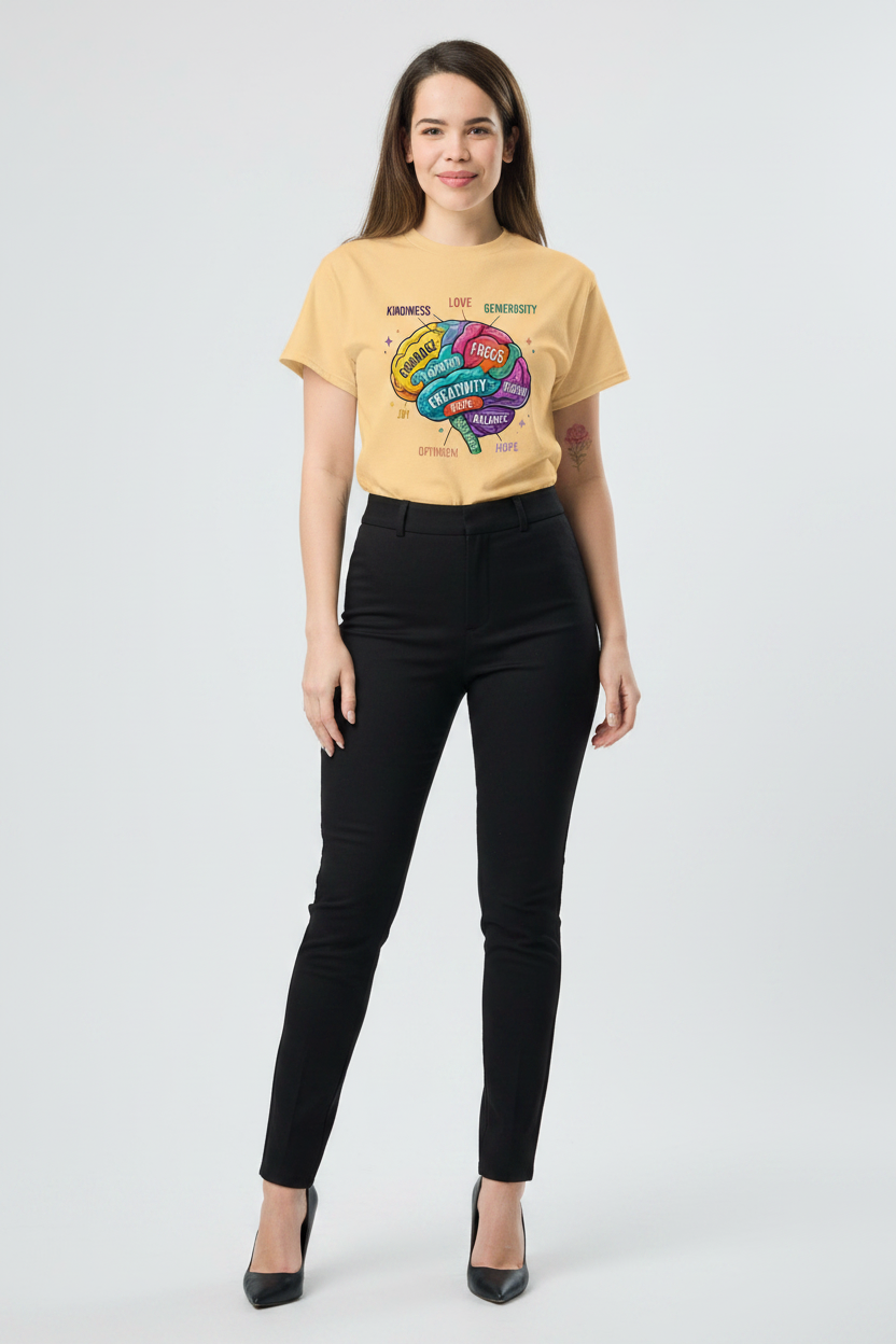 Woman wearing a yellow t-shirt with a colorful brain graphic on a white background